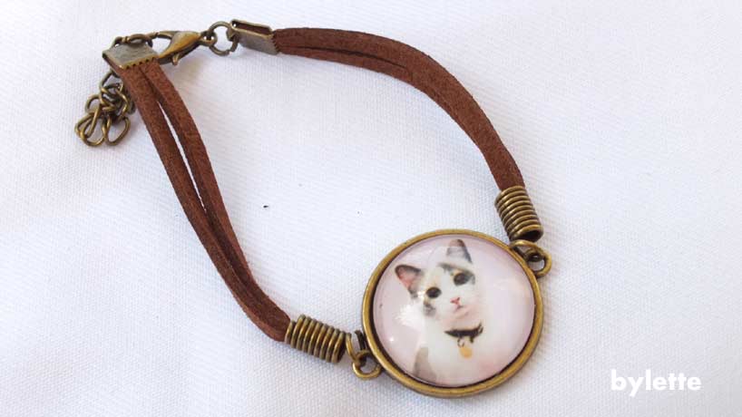 Bracelet anneau fantaisie epoxy chat blanc